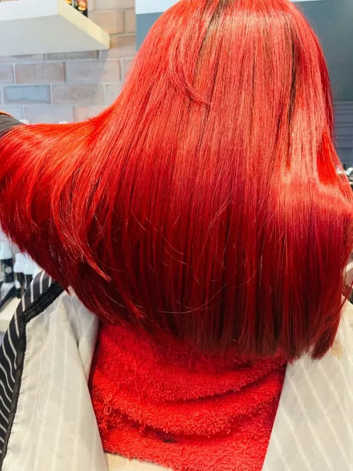 Vivid red colour by Hair Poetry